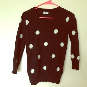 Black polka dot sweater.